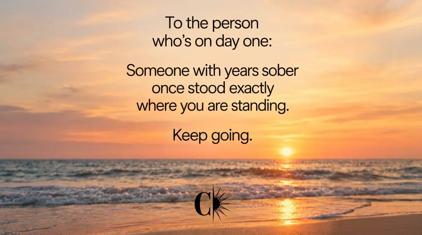 Sobriety encouragement message over a sunset reminding people on day one to keep going.